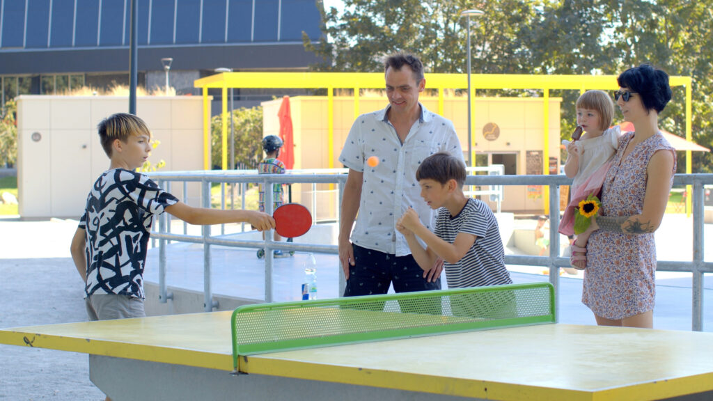 A family enjoying a screen-free activity together.